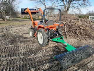 HitachiNX25 frontaallaadurKubota KL25