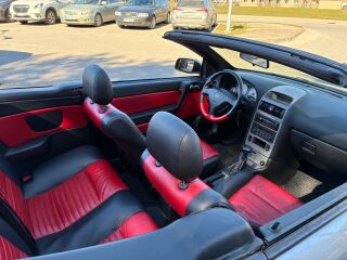 Opel Astra BERTONE 2.2 108кВ