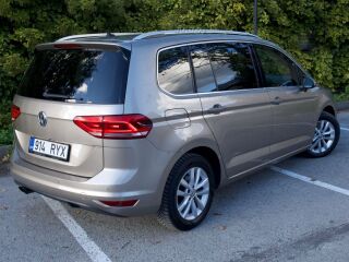 Volkswagen Touran Highline 1.4 R4 110кВ