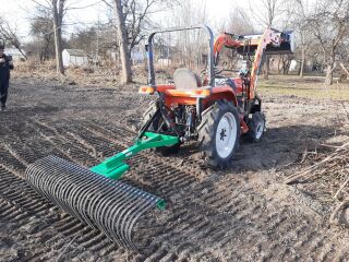 HitachiNX25 frontaallaadurKubota KL25