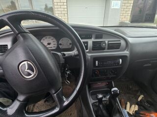 Mazda B2500 2.5 80кВ