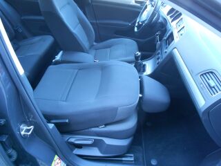 Volkswagen Golf Comfortline 1.2 77кВ