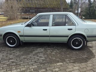 Mazda 626 LX 2.0 66kW
