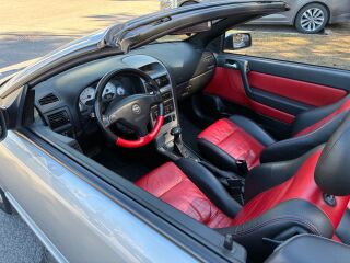 Opel Astra BERTONE 2.2 108кВ