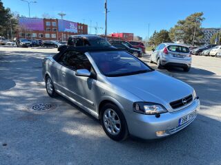 Opel Astra BERTONE 2.2 108кВ