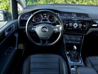 Volkswagen Touran Highline 1.4 R4 110кВ