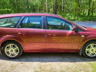 Ford Focus Ghia 1.6 TI- VCT 85кВ