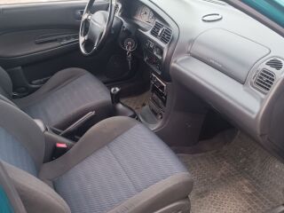 Mazda 323 1.5 R4 65kW