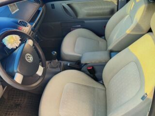 Volkswagen New Beetle 1.6 75кВ