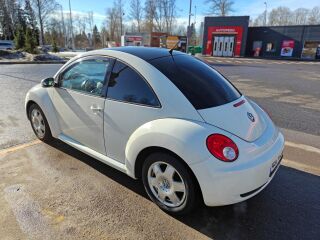 Volkswagen New Beetle 1.6 75кВ