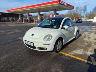 Volkswagen New Beetle 1.6 75кВ