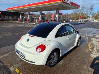 Volkswagen New Beetle 1.6 75кВ