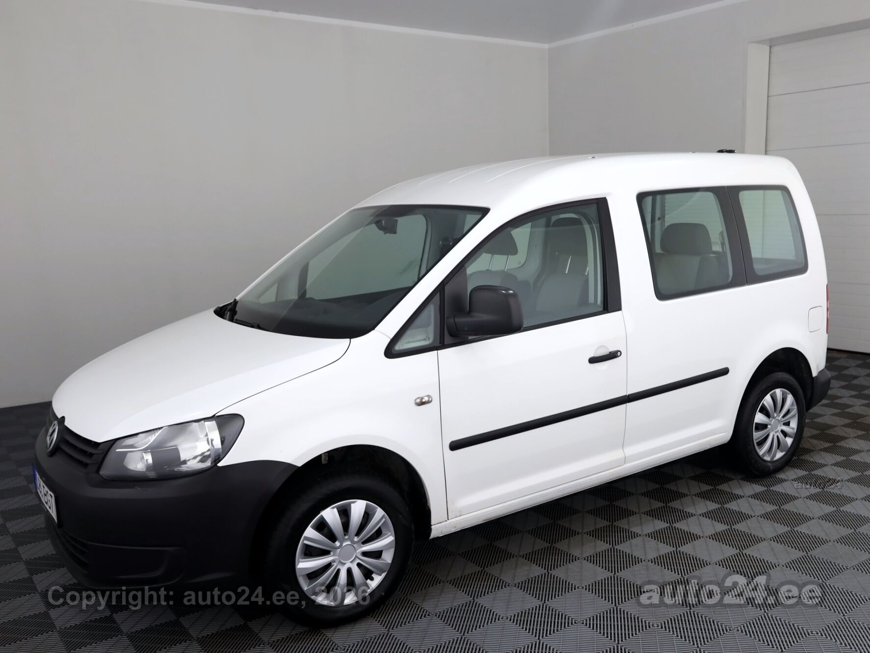 Volkswagen Caddy 2012 — вигляд ззаду