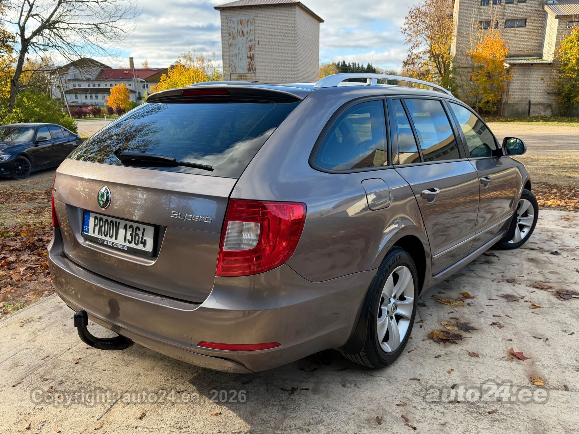 Skoda Superb 2011 — rear view