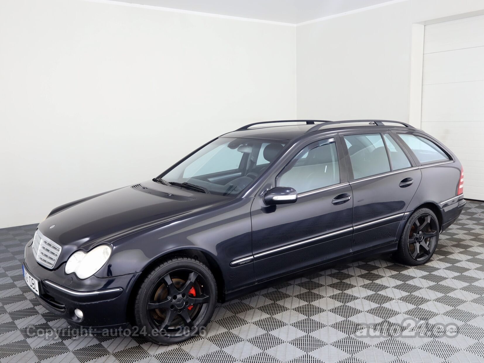 Mercedes-Benz C-Class 2006 — вигляд ззаду