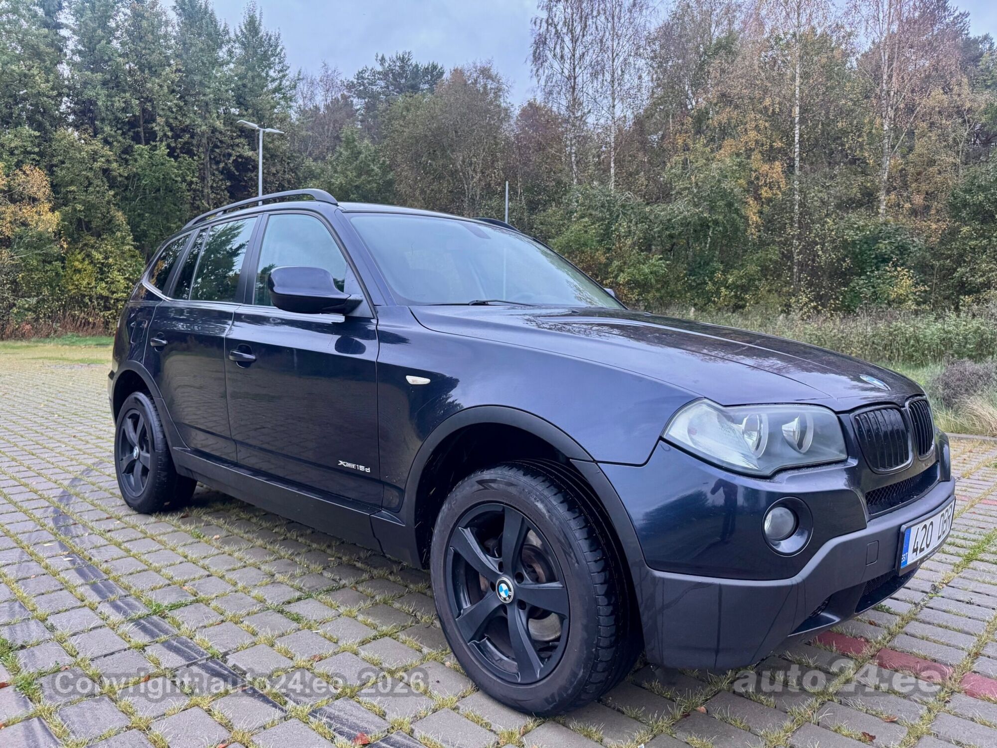 BMW X3 2009 — rear view